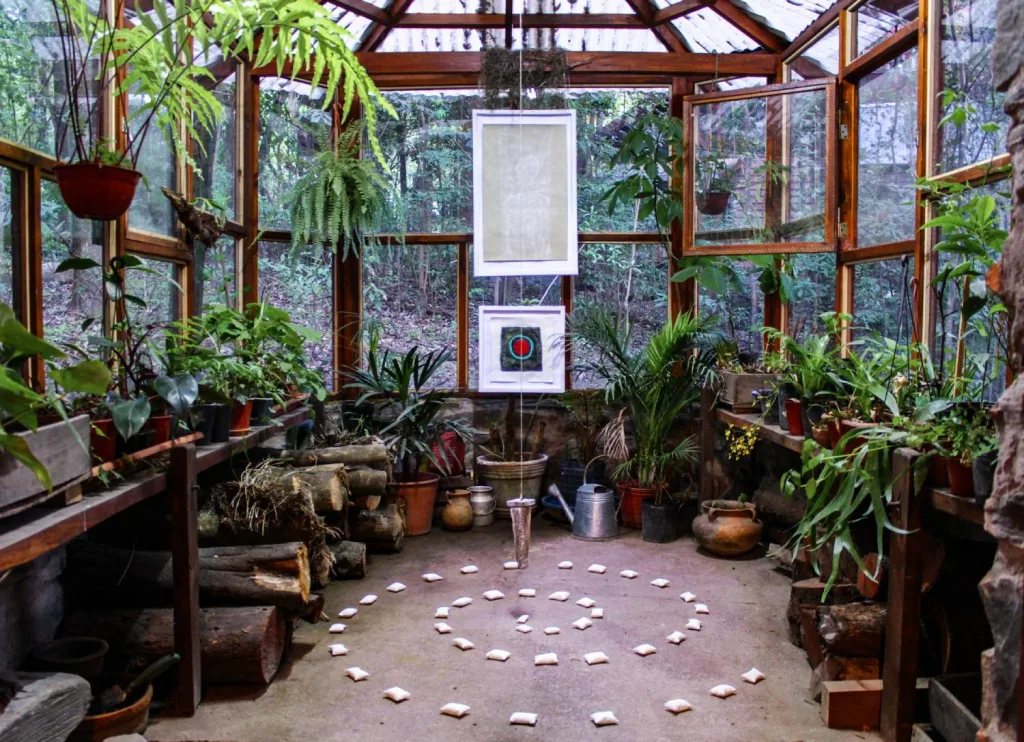 greenhouse with rock circle meditation